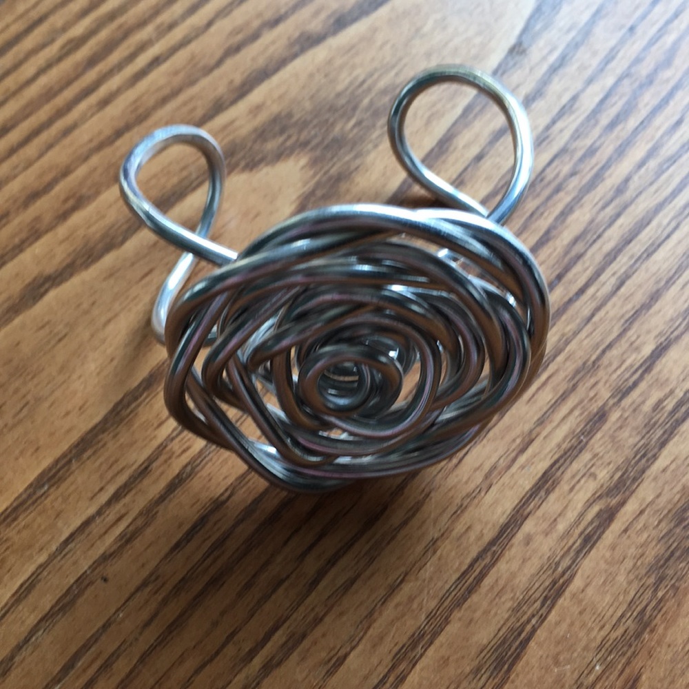 Silver rosette cuff bracelet